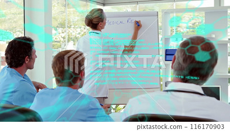 Image of data processing against caucasian female doctors giving a presentation at hospital 116170903
