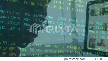 Image of stock market data over african american businessman in eyeglasses working over computer Image of stock market data over african american businessman in eyeglasses working over computer 116171012