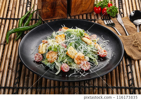 Tasty Caesar salad with prawn Tasty Caesar salad with prawn 116173835