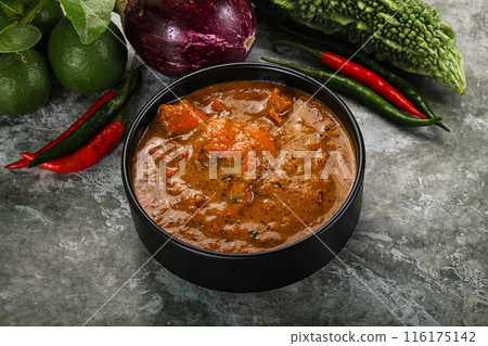 Indian cuisine - chicken curry with spices Indian cuisine - chicken curry with spices 116175142