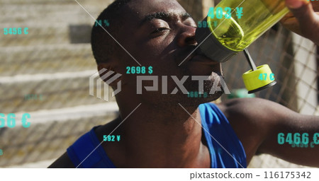 Image of changing numbers, currency symbols, tired african american athlete drinking water 116175342