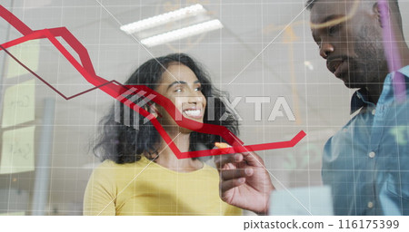 Image of falling graphs, diverse coworkers discussing strategy and sticking notes on glass wall Image of falling graphs, diverse coworkers discussing strategy and sticking notes on glass wall 116175399