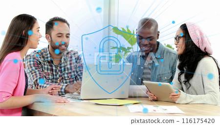 Image of security padlock icon against diverse colleagues discussing over a laptop at office 116175420