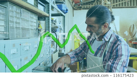 Image of green graph processing over mature caucasian male carpenter in workshop 116175423