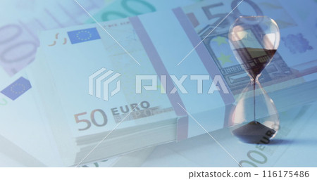 Image of euro currency banknotes over hourglass Image of euro currency banknotes over hourglass 116175486