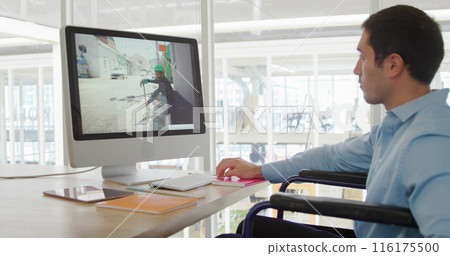 Image of biracial colleague wearing blue shirt, focusing on computer screen Image of biracial colleague wearing blue shirt, focusing on computer screen 116175500