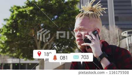 Image of numbers, icons in notification bars, albino african american man talking on cellphone Image of numbers, icons in notification bars, albino african american man talking on cellphone 116175508