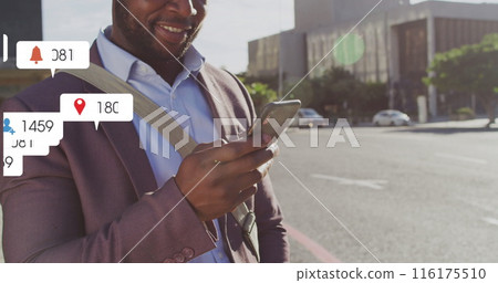 Image of multiple notification bars over smiling african american man scrolling on smartphone Image of multiple notification bars over smiling african american man scrolling on smartphone 116175510