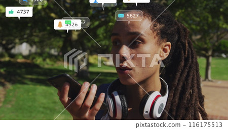 Image of multiple notification bars over biracial woman talking on speaker of cellphone Image of multiple notification bars over biracial woman talking on speaker of cellphone 116175513