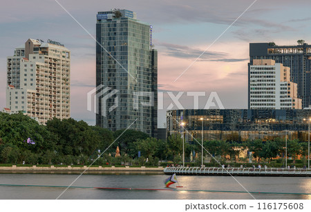 Cityscape office buildings with modern architecture with reflection on the surface of water. 116175608