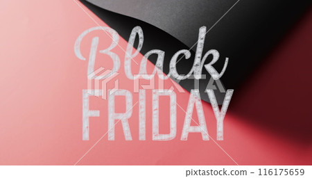 Image of black friday text over rolled up black paper on red background Image of black friday text over rolled up black paper on red background 116175659