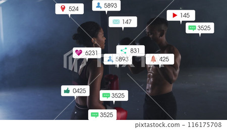 Image of notification bars , african american man and woman giving high fives before practice 116175708