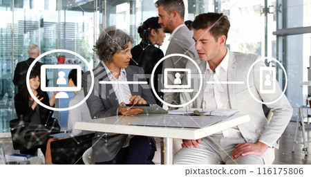 Image of network of icons over diverse businessman and businesswoman discussing at office Image of network of icons over diverse businessman and businesswoman discussing at office 116175806