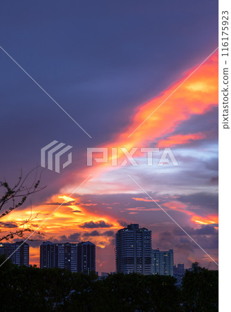 Blue, Orange and Yellow sky over cityscape after sunset. Blue, Orange and Yellow sky over cityscape after sunset. 116175923