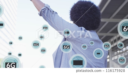 Image of multiple 6g texts over rear view of biracial man raising hands to stop cab 116175928