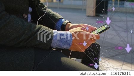 Biracial young professional holding smartphone, showing digital interface Biracial young professional holding smartphone, showing digital interface 116176211