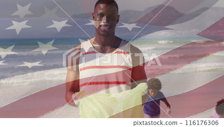 Image of flag of united states of america over happy african american father and son on beach Image of flag of united states of america over happy african american father and son on beach 116176306