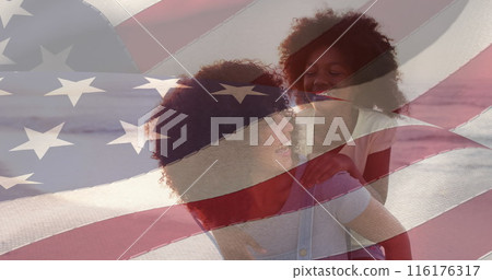 Image of flag of united states of america over happy african american mother with daughter 116176317