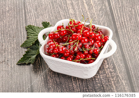 Sweet ripe red currant berries Sweet ripe red currant berries 116176385