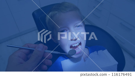 Caucasian boy sitting in dentist chair, opening mouth for checkup Caucasian boy sitting in dentist chair, opening mouth for checkup 116176491