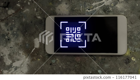 Image of gr code over smartphone lying on grey surface 116177041