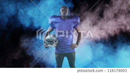 Image of colourful powders over american football player 116178003