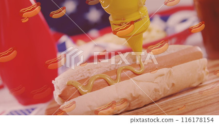 Image of hot dog icons over hot dogs being prepared 116178154