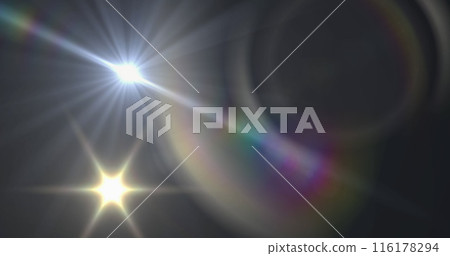 Digital image of multiple colorful light spots moving against dark background 116178294