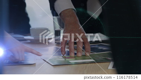 Image of caucasian woman pointing safe over two laptop screen with through spinning through human Image of caucasian woman pointing safe over two laptop screen with through spinning through human 116178514
