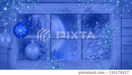 Image of snowflakes over window with night winter landscape and baubles 116178917