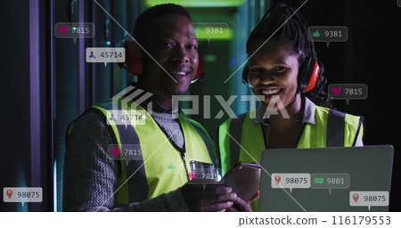 Image of social media icons over african american male and female engineers at server room Image of social media icons over african american male and female engineers at server room 116179553