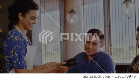 Image of graphs, trading boards, diverse female barista handing credit card reader to customer Image of graphs, trading boards, diverse female barista handing credit card reader to customer 116179979