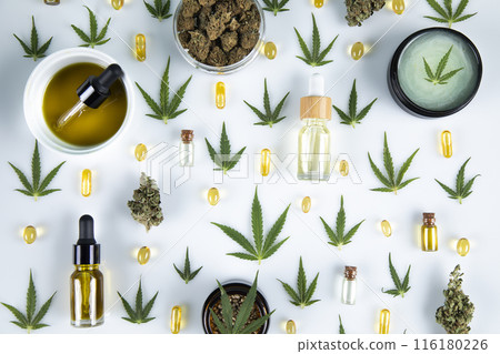 Hemp oil and cannabis leaves, marijuana on white background Hemp oil and cannabis leaves, marijuana on white background 116180226