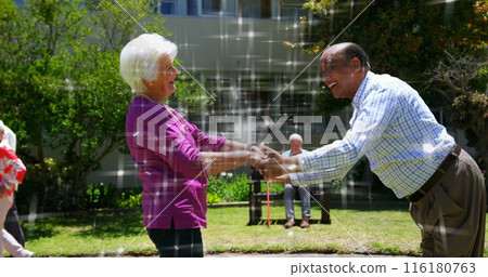 Image of light spots over diverse senior friends dancing Image of light spots over diverse senior friends dancing 116180763