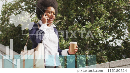 Image of data processing over african american businesswoman walking 116180814