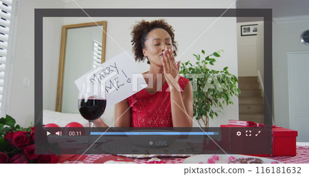 Image of image interface over african american woman having image call Image of image interface over african american woman having image call 116181632