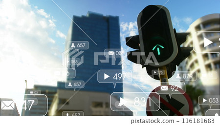 Image of notification icons with numbers over traffic signal changing lights in city 116181683