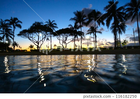 Sunset on the beach seen from the ocean in Hawaii Sunset on the beach seen from the ocean in Hawaii 116182250