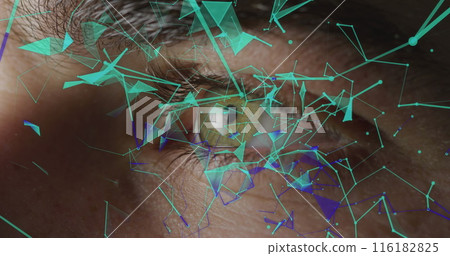 Caucasian young professional examining digital interfaces overlaid on his eye 116182825