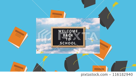 Graduation hat and book icons falling over back to school text on wooden slate on blue background 116182940