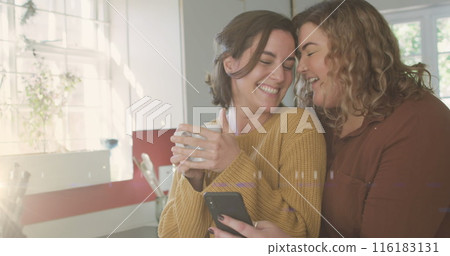 Image of light over happy caucasian female gay couple Image of light over happy caucasian female gay couple 116183131