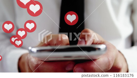 Image of hearts over hands of biracial man using smartphone 116183176