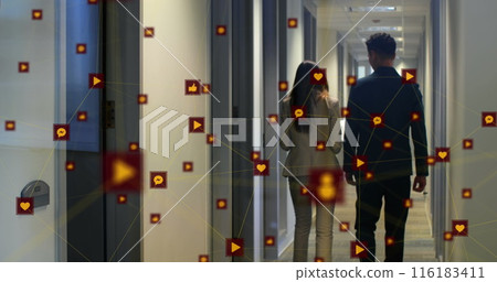 Image of network of connections with icons over two business people Image of network of connections with icons over two business people 116183411