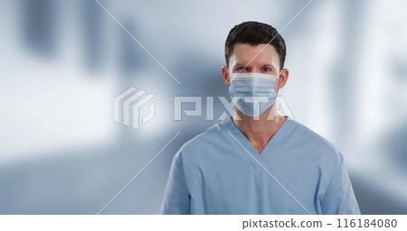Image of caucasian male doctor over hospital 116184080