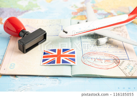 Bangkok, Thailand, March 1, 2024 Approved Stamp visa and passport with United Kingdom flag document to immigration at airport in country. 116185055