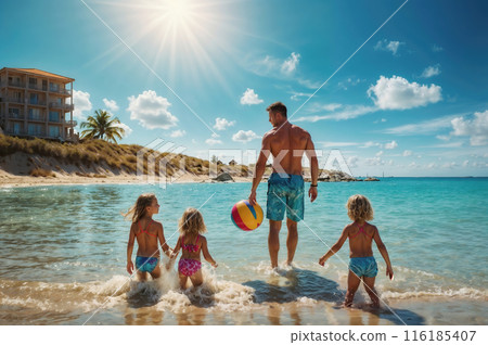 Happy family walking into ocean water on summer vacation 116185407
