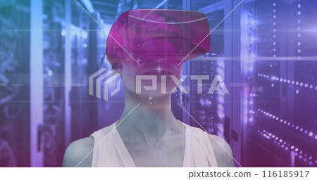 Caucasian female manager in VR headset, standing with short blonde hair Caucasian female manager in VR headset, standing with short blonde hair 116185917