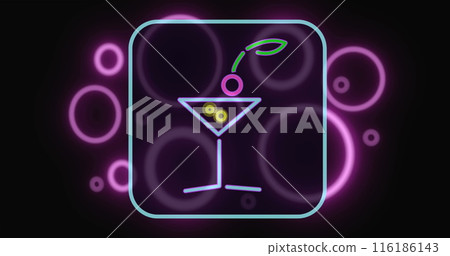 Neon sign showing martini glass with olive and cherry, glowing in purple hues 116186143