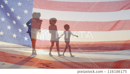 African American family of four holding hands, walking on beach African American family of four holding hands, walking on beach 116186175