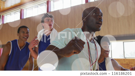 Group of athletes, including Caucasian and African American men, are running in gym Group of athletes, including Caucasian and African American men, are running in gym 116186201